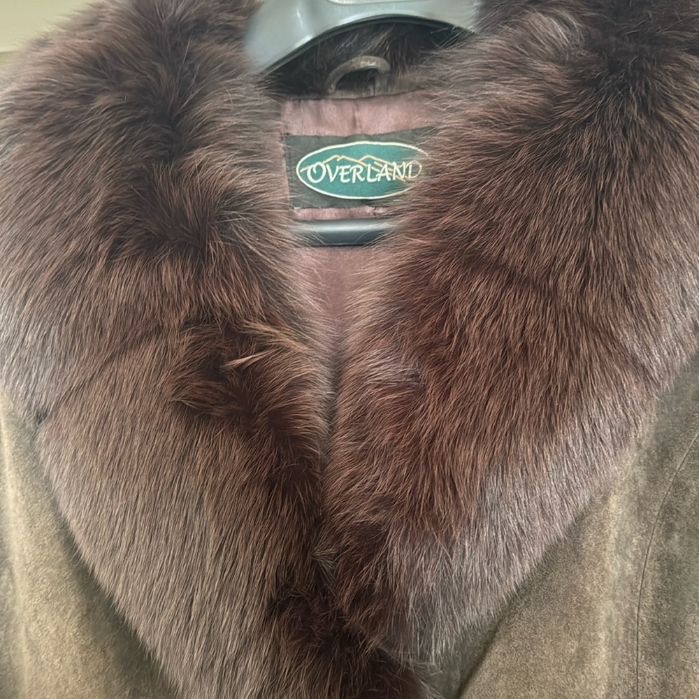 Suede, fox fur trimmed jacket with nice lining. Worn a few times.